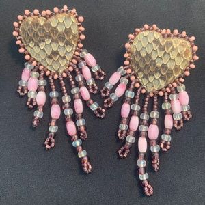 Vintage Native American Hand crafted Beaded post Earrings with feather inlay.